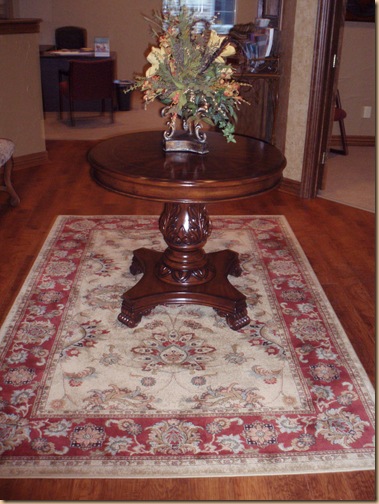 Oriental Rug and Beautiful Table Welcome Clients